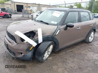2014 MINI Countryman S z VIN WMWZC5C54EWM17898, wystawiony jako IAAI lot #42343469 z przebiegiem 112 773 mil mil oraz . Historia ofert i sprzedaży dostępna na DreamBid. Obrazek 2.