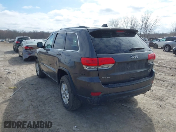 2015 Jeep Grand Cherokee Laredo with VIN 1C4RJFAG6FC140581, listed as a IAAI auction lot 41869952 with 193,295 mi miles. Bid and sale history available at carsss.com. Image 3.