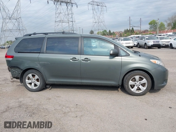 2014 Toyota Sienna LE AAS with VIN 5TDKK3DC8ES432364, listed as a IAAI auction lot 42081378 with 187,131 mi miles and . Bid and sale history available at DreamBid. Image 14.
