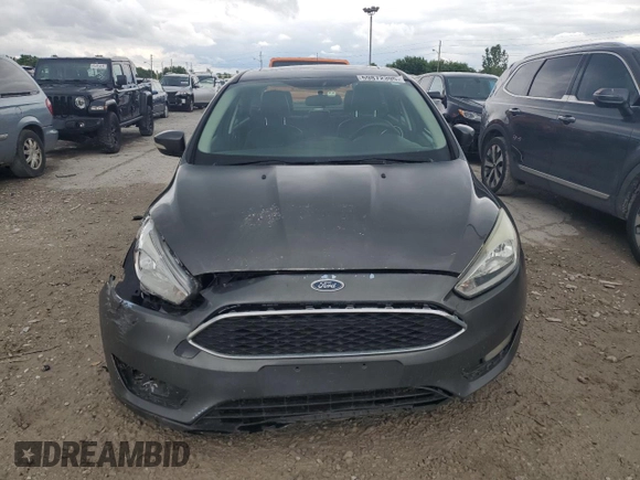 2015 Ford Focus Titanium с VIN 1FADP3J21FL254702, выставлен на аукционе Copart как лот 59872395 с пробегом 93 195 миль миль и Списание • Salvage title. История ставок и продаж доступна на DreamBid. Изображение 5.
