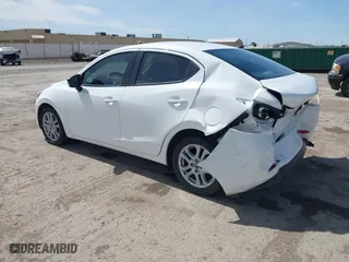 2017 Toyota Yaris iA with VIN 3MYDLBYV9HY185026, listed as a IAAI auction lot 41834005 with 57,025 mi miles. Bid and sale history available at carsss.com. Image 3.