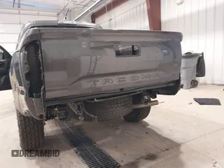 2023 Toyota Tacoma SR с VIN 3TYCZ5AN0PT178013, выставлен на аукционе IAAI как лот 42180865 с пробегом 19 355 миль миль и . История ставок и продаж доступна на DreamBid. Изображение 6.