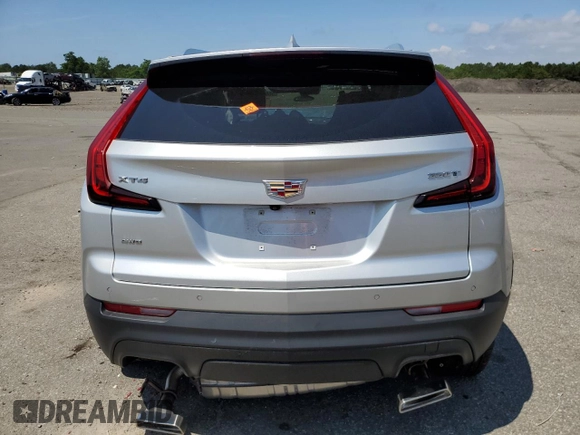 2022 Cadillac XT4 AWD Luxury with VIN 1GYFZBR45NF118075, listed as a Copart auction lot 58654423 with 1,982 mi miles and . Bid and sale history available at carsss.com. Image 6.