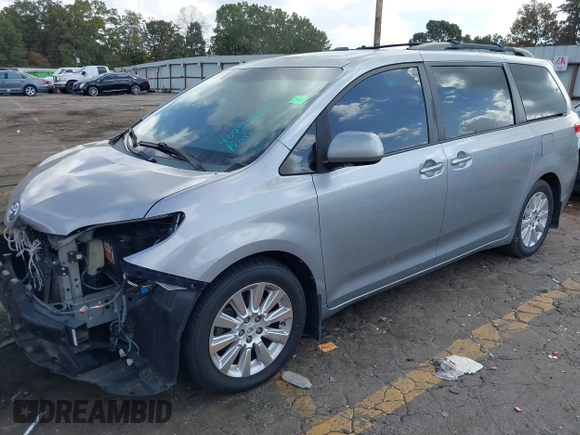 2011 Toyota Sienna XLE AAS with VIN 5TDYK3DC8BS157794, listed as a IAAI auction lot 40759823 with 211,716 mi miles and . Bid and sale history available at DreamBid. Image 17.