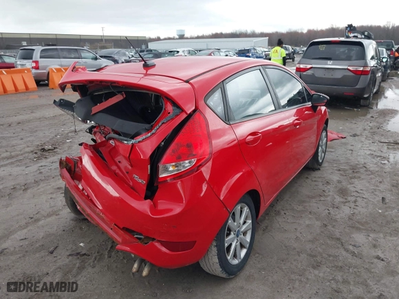 2012 Ford Fiesta SE with VIN 3FADP4EJ0CM161199, listed as a IAAI auction lot 41936545 with 160,303 mi miles. Bid and sale history available at carsss.com. Image 4.