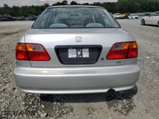 1999 Honda Civic DX with VIN 1HGEJ662XXL027828, listed as a Copart auction lot 72623664 with 133,302 mi miles and Salvage Title. Bid and sale history available at carsss.com. Image 6.