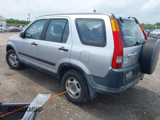 2002 Honda CR-V LX z VIN JHLRD78552C080484, wystawiony jako IAAI lot #42471119 z przebiegiem 256 937 mil mil oraz . Historia ofert i sprzedaży dostępna na DreamBid. Obrazek 3.