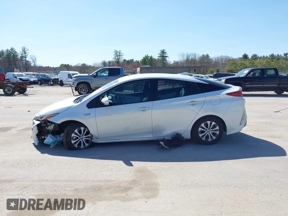2021 Toyota Prius LE with VIN JTDKAMFP8M3174629, listed as a IAAI auction lot 42087974 with 16,348 mi miles and . Bid and sale history available at DreamBid. Image 14.