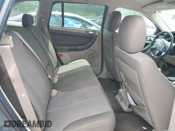 2005 Chrysler Pacifica z VIN 2C8GM48L75R453259, wystawiony jako Copart lot #57234075 z przebiegiem 158 034 mil mil oraz Szkoda całkowita • Salvage title. Historia ofert i sprzedaży dostępna na DreamBid. Obrazek 11.
