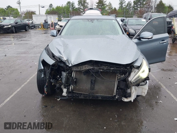 2015 Infiniti Q50 Premium with VIN JN1BV7AR4FM393974, listed as a IAAI auction lot 41874345 with 148,228 mi miles. Bid and sale history available at carsss.com. Image 6.