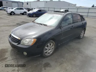 2005 Kia Spectra with VIN KNAFE162655074198, listed as a Copart auction lot 71015104 with 200,819 mi miles and Salvage Title. Bid and sale history available at carsss.com. Image 1.