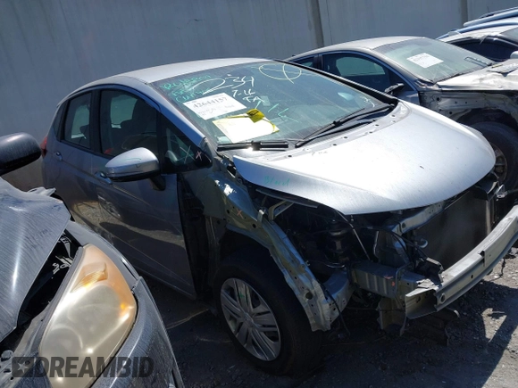 2019 Honda Fit LX z VIN 3HGGK5H42KM733455, wystawiony jako IAAI lot #42644157 z przebiegiem 51 036 mil mil oraz . Historia ofert i sprzedaży dostępna na DreamBid. Obrazek 1.