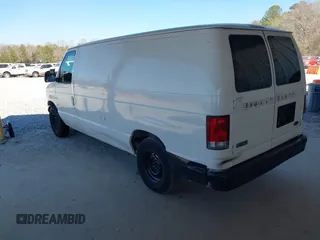1999 Ford Econoline Cargo with VIN 1FTRE1429XHC29847, listed as a IAAI auction lot 41680406 with 262,002 mi miles. Bid and sale history available at carsss.com. Image 3.