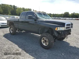 2000 Dodge Ram 2500 with VIN 3B7KF2364YG141972, listed as a Copart auction lot 70001534 with 184,140 mi miles and Salvage Title. Bid and sale history available at carsss.com. Image 4.