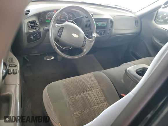 2003 Ford F-150 with VIN 2FTRF08L03CA03160, listed as a Copart auction lot 51591535 with 220,630 mi miles and Salvage title. Bid and sale history available at DreamBid. Image 8.