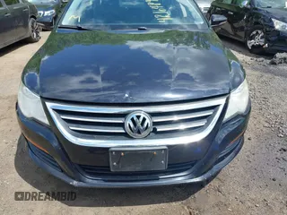 2011 Volkswagen CC Sport with VIN WVWMP7AN8BE709541, listed as a IAAI auction lot 42164892 with 154,547 mi miles. Bid and sale history available at carsss.com. Image 6.