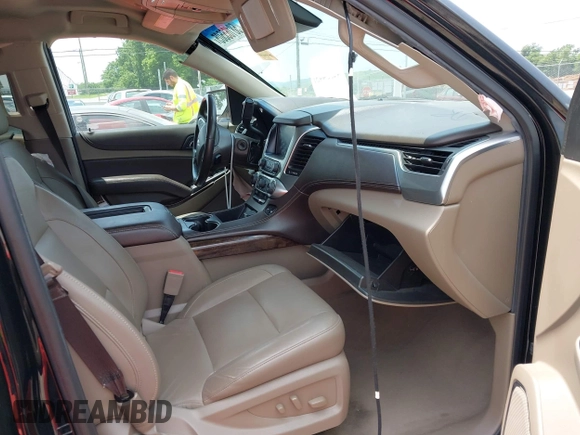 2019 Chevrolet Tahoe LT z VIN 1GNSKBKC5KR388869, wystawiony jako IAAI lot #42354451 z przebiegiem 111 359 mil mil oraz . Historia ofert i sprzedaży dostępna na DreamBid. Obrazek 5.