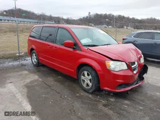 2012 Dodge Grand Caravan SXT with VIN 2C4RDGCG3CR408077, listed as a IAAI auction lot 41532827 with 170,716 mi miles. Bid and sale history available at carsss.com. Image 1.