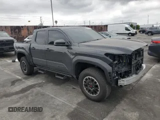 2025 Toyota Tacoma SR with VIN 3TMLB5JN4SM104263, listed as a Copart auction lot 54402775 with 1,010 mi miles and Salvage Title. Bid and sale history available at DreamBid. Image 4.