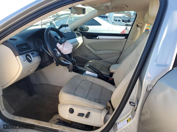 2012 Volkswagen Passat SE with VIN 1VWBH7A30CC067572, listed as a Copart auction lot 87018124 with 191,468 mi miles and Salvage Title. Bid and sale history available at carsss.com. Image 7.
