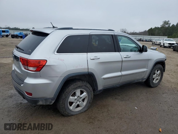 2012 Jeep Grand Cherokee Laredo with VIN 1C4RJFAG2CC294202, listed as a Copart auction lot 44918715 with 104,605 mi miles and Salvage Title. Bid and sale history available at carsss.com. Image 3.