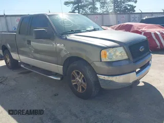 2005 Ford F-150 XLT with VIN 1FTPX12575NA22872, listed as a IAAI auction lot 41532157 with 261,093 mi miles. Bid and sale history available at carsss.com. Image 1.