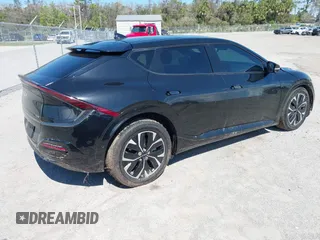2022 Kia EV6 GT-Line with VIN KNDC44LA7N5027008, listed as a IAAI auction lot 41679245 with 54,042 mi miles. Bid and sale history available at carsss.com. Image 4.