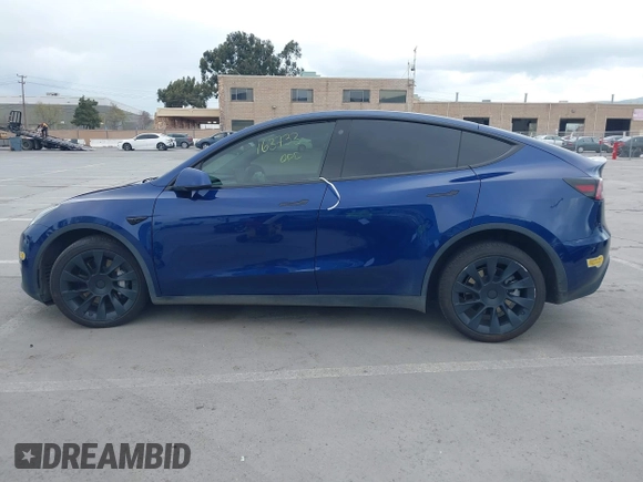 2022 Tesla Model Y Long Range with VIN 7SAYGDEE6NF480146, listed as a IAAI auction lot 41906361 with 31,939 mi miles and . Bid and sale history available at carsss.com. Image 14.
