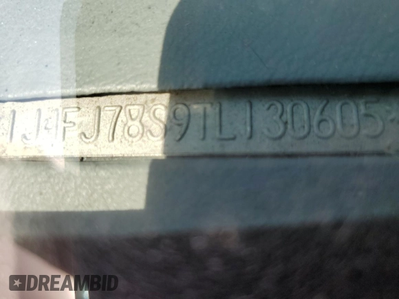 1996 Jeep Cherokee Country with VIN 1J4FJ78S9TL130605, listed as a Copart auction lot 74673934 with 196,857 mi miles and Salvage Title. Bid and sale history available at carsss.com. Image 14.