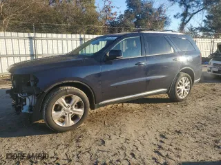 2014 Dodge Durango Limited with VIN 1C4RDJDG0EC592532, listed as a Copart auction lot 89161945 with 113,102 mi miles and Salvage Title. Bid and sale history available at carsss.com. Image 1.