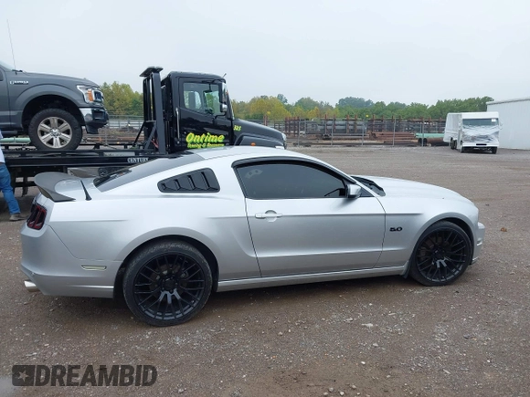 2013 Ford Mustang GT with VIN 1ZVBP8CF7D5281965, listed as a IAAI auction lot 40408688 with 121,477 mi miles. Bid and sale history available at carsss.com. Image 13.