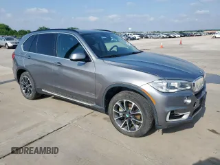 2016 BMW X5 xDrive40e with VIN 5UXKT0C55G0S76089, listed as a Copart auction lot 54814555 with 60,802 mi miles and Clean Title. Bid and sale history available at DreamBid. Image 4.