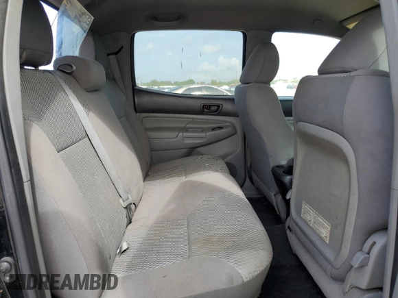 2015 Toyota Tacoma с VIN 3TMMU4FN6FM073394, выставлен на аукционе Copart как лот 64592495 с пробегом 156 753 миль миль и Списание • Salvage title. История ставок и продаж доступна на DreamBid. Изображение 10.