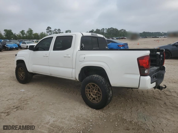 2023 Toyota Tacoma 4WD SR with VIN 3TMCZ5AN8PM570846, listed as a Copart auction lot 51328065 with 71,963 mi miles and Salvage Title. Bid and sale history available at carsss.com. Image 2.