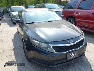 2011 Kia Optima LX with VIN KNAGM4A71B5055033, listed as a IAAI auction lot 42047870 with 286,173 mi miles and . Bid and sale history available at carsss.com. Image 1.