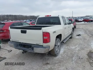 2013 Chevrolet Silverado 1500 LT with VIN 3GCPKSE76DG303067, listed as a IAAI auction lot 41624587 with 113,259 mi miles. Bid and sale history available at carsss.com. Image 4.