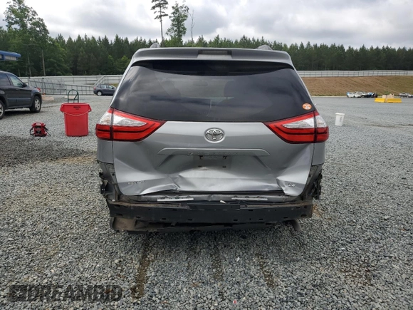 2016 Toyota Sienna XLE with VIN 5TDYK3DC8GS715148, listed as a Copart auction lot 57834045 with 128,769 mi miles and Salvage title. Bid and sale history available at DreamBid. Image 6.