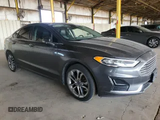2020 Ford Fusion SEL z VIN 3FA6P0CD3LR131180, wystawiony jako Copart lot #63843355 z przebiegiem 146 705 mil mil oraz Czysty tytuł • Clean title. Historia ofert i sprzedaży dostępna na DreamBid. Obrazek 4.