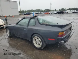 1986 Porsche 944 z VIN WP0AA0940GN454706, wystawiony jako Copart lot #58560615 z przebiegiem 123 825 mil mil oraz Czysty tytuł • Clean title. Historia ofert i sprzedaży dostępna na DreamBid. Obrazek 2.
