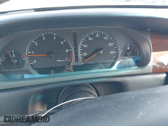 1999 Cadillac Eldorado Touring z VIN 1G6ET129XXU603042, wystawiony jako IAAI lot #41699955 z przebiegiem 81 704 mil mil oraz . Historia ofert i sprzedaży dostępna na DreamBid. Obrazek 7.