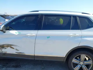 2019 Volkswagen Tiguan SEL Premium with VIN 3VV4B7AX0KM007788, listed as a IAAI auction lot 41227707 with 67,859 mi miles. Bid and sale history available at carsss.com. Image 14.