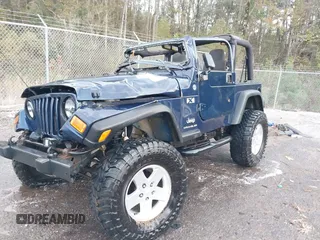 2006 Jeep Wrangler X with VIN 1J4FA39SX6P735379, listed as a IAAI auction lot 40945788 with 69,868 mi miles. Bid and sale history available at carsss.com. Image 2.