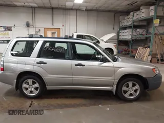 2006 Subaru Forester 2.5 X with VIN JF1SG636X6H712880, listed as a IAAI auction lot 40062211 with 127,537 mi miles. Bid and sale history available at carsss.com. Image 13.