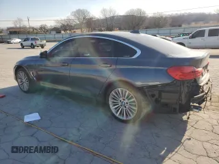 2015 BMW 4 Series 428i with VIN WBA4A9C52FD416219, listed as a Copart auction lot 48703365 with 87,162 mi miles and Clean title. Bid and sale history available at DreamBid. Image 2.