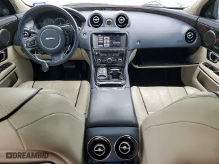 2014 Jaguar XJ with VIN SAJWJ2GD6E8V65987, listed as a Copart auction lot 50091105 with 136,080 mi miles and Clean Title. Bid and sale history available at carsss.com. Image 8.