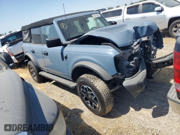 2023 Ford Bronco z VIN 1FMDE5BHXPLA99837, wystawiony jako Copart lot #56073885 z przebiegiem 9 679 mil mil oraz Szkoda całkowita • Salvage title. Historia ofert i sprzedaży dostępna na DreamBid. Obrazek 4.