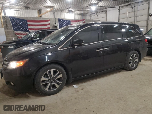 2014 Honda Odyssey Touring z VIN 5FNRL5H91EB128917, wystawiony jako Copart lot #49353085 z przebiegiem 208 871 mil mil oraz Czysty tytuł • Clean title. Historia ofert i sprzedaży dostępna na DreamBid. Obrazek 1.