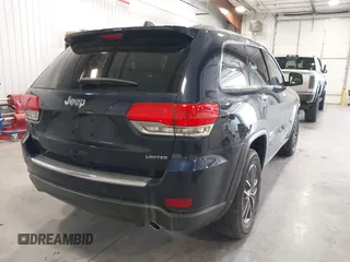 2018 Jeep Grand Cherokee Limited with VIN 1C4RJFBG4JC334582, listed as a IAAI auction lot 42137075 with 57,400 mi miles and . Bid and sale history available at DreamBid. Image 4.