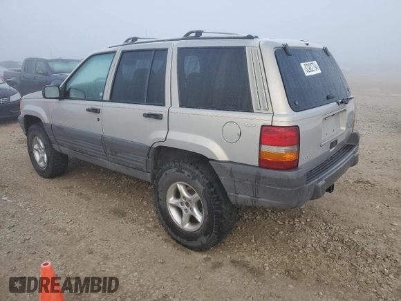 1997 Jeep Grand Cherokee Laredo with VIN 1J4GZ58Y6VC603370, listed as a Copart auction lot 82802794 with 0 mi miles and Salvage Title. Bid and sale history available at carsss.com. Image 2.