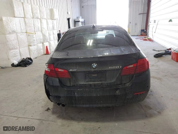 2016 BMW 5 Series 528i xDrive with VIN WBA5A7C52GG145199, listed as a IAAI auction lot 41424227 with 100,611 mi miles. Bid and sale history available at carsss.com. Image 16.